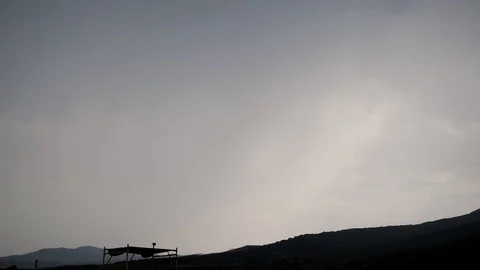 Summer. Gray sky before a storm. Lightning. In the mountains Stock Footage 129657495