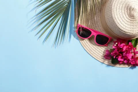 Summer hat on the blue background Stock Photos
