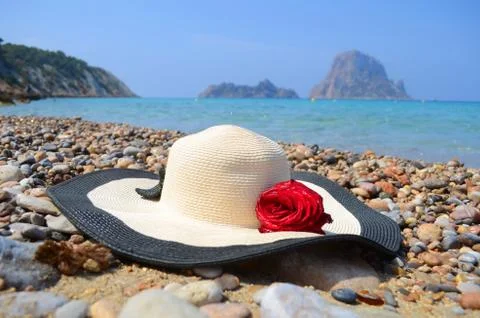 Summer hat with a rose on the beach Es Vedra - Ibiza Stock Photos