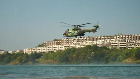 Summer heatwave and climate change fuel forest fires as rescue helicopter Stock Footage 343055960