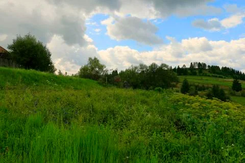 Summer Hill with Clouds Stock Photos