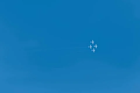 Summer holiday background with clear blue skies and white airplanes with smok Stock Illustration