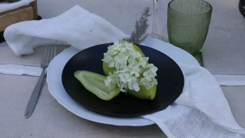 Summer holiday table setting in the backyard garden in a green palette in vegan  Video stock 278790510