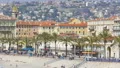 Summer holidays in Nice, people sunbathing on the beach, sunny resort city HD Footage