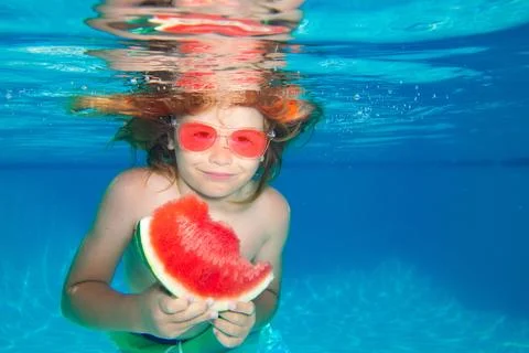 Happy woman swimming in pool in red swimsuit with loose long hair