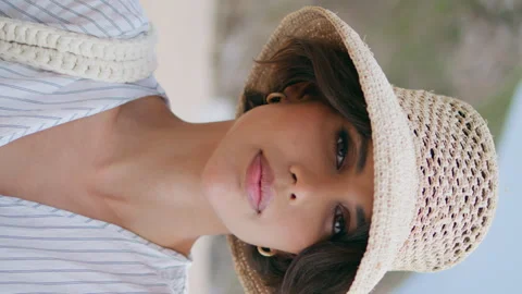 Summer lady posing beach in straw hat vertically closeup. Girl resting seashore Stock Footage 275514716