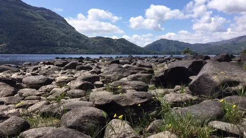 Summer At Lake Low Angle, Rocks Foreground, Mountain Backdrop, Killarney Video stock 90818685