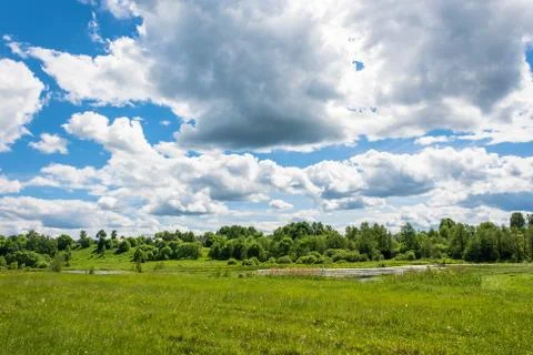 Summer landscape with clouds. Stock Photos
