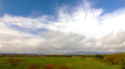 Summer landscape cumulus clouds over countyside, time-lapse. Stock-Footage 62727588