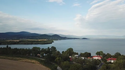 Summer landscape with fields, meadows, lake and mountains. Stock Footage 125846103