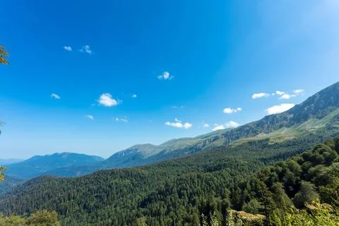 Summer landscape in the mountains and dark blue sky with clouds. Stock Photos