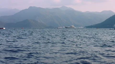 Summer landscape with sea, mountain range and luxury yacht Stock Footage 51444834