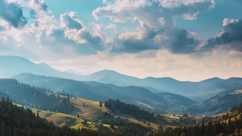 Summer landscape time lapse. Clouds passing in blue sky over mountain range Stock Footage 152716677