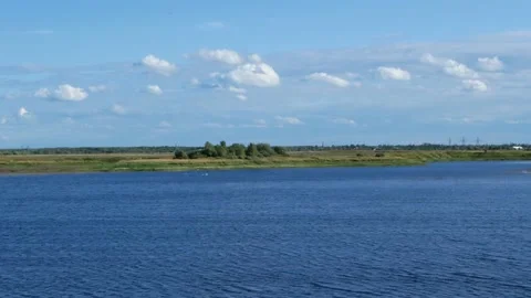 Summer landscape - white clouds over the river. Stock Footage 161013431