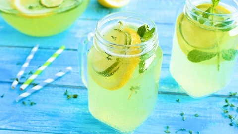 Summer lemonade with thyme and lime Stock Footage 92262148