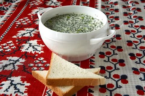 Summer light cold soup with cucumber, radish, egg and dill with the additio.. Stock Photos