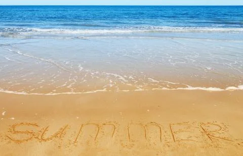 Summer message on the sand Stock Photos