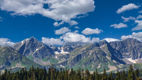 Summer mountain chains under a cloudy sky 库存影片 339055941