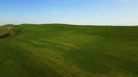 Summer mountain landscape with green fields and hills, taken from a height Stock Footage 278613319
