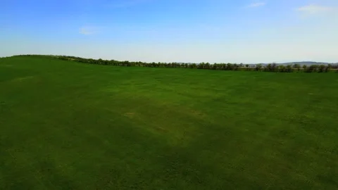 Summer mountain landscape with green fields and hills, taken from a height Stock Footage 278613367