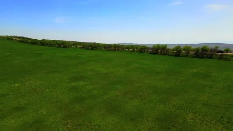 Summer mountain landscape with green fields and hills, taken from a height Stock Footage 278613380