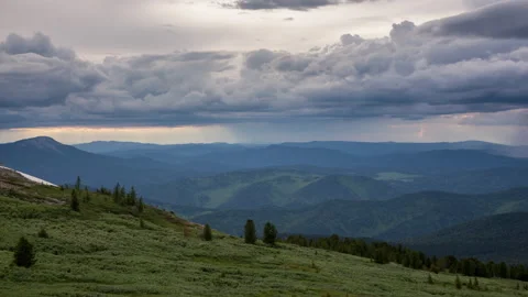 Summer mountain valley with dramatic sky Video stock 176219981
