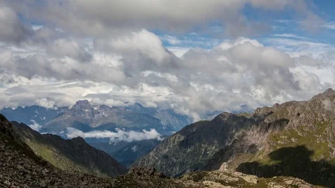 Summer mountains time lapse. Clouds movement at sunny weather Stock-Footage 83730591