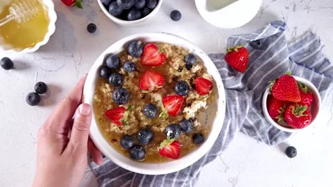 Summer oatmeal with berry Video stock 197378589