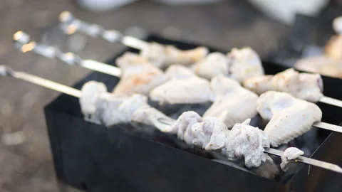 Summer or spring barbecue with ribs and chicken Stock Footage 106355221
