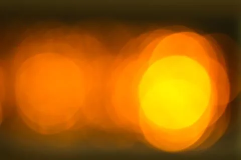Summer orange background with bokeh Stock Photos