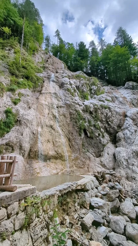Summer Palenk waterfall cascading down steep rocks in Logar valley Slovenia Vídeos de archivo 341678519