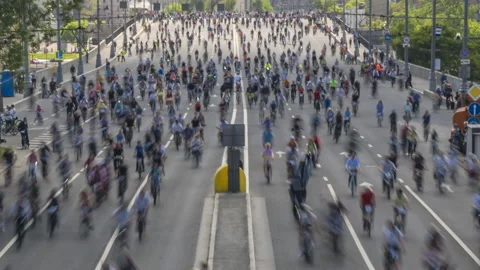 Summer parade of cyclists in the Central streets of the city,time lapse Video stock 123321760