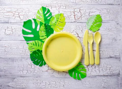 Summer party table setting with yellow dishes Stock Photos