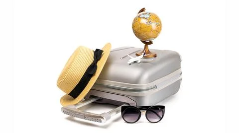 Summer pattern background. Suitcase, sunglasses with toy plane, straw hat and Foto stock