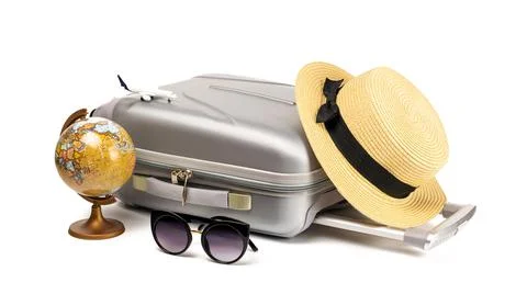 Summer pattern background. Suitcase, sunglasses with toy plane, straw hat and 스톡 사진