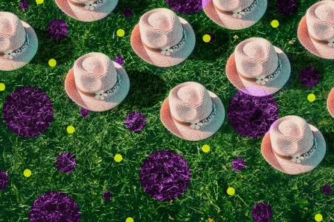 Summer pattern Pink sunhat on grass. Pop art, creative summer party concept Stock Photos