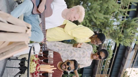 Summer picnic, complete with a guitar, snacks, and drinks Stock-Footage 278816337