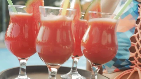 Summer pool party. Close up of fresh juice. Stock Footage 88699883
