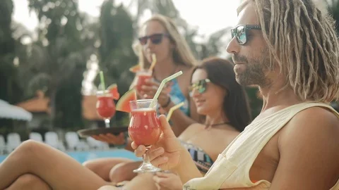 Summer pool party. Close up of fresh juice. Stock Footage 88701586