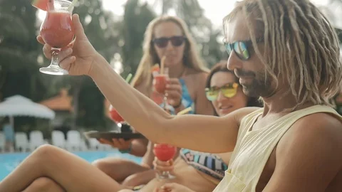 Summer pool party. Close up of fresh juice. Stock Footage 88702747
