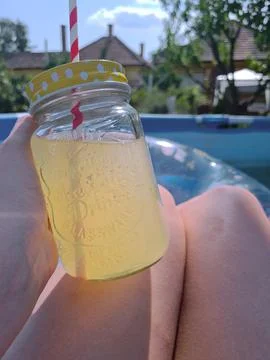 Summer pool party with drinks Stock Photos