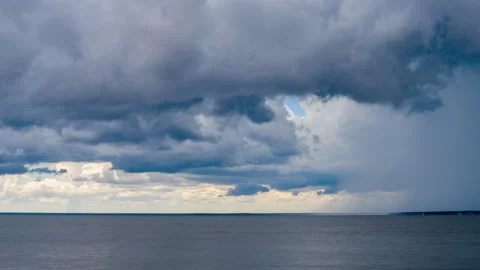 Summer Rain Cell Over Ocean Stock Footage 204771540