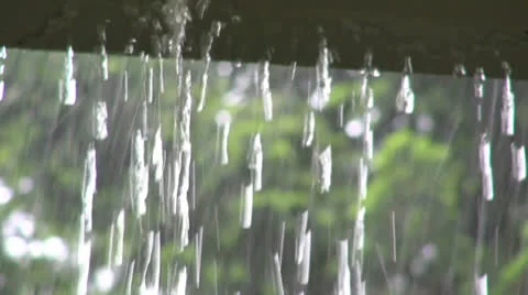 Summer rain overflows a gutter Stock Footage 26356291