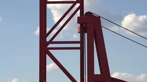 Summer, red iron structure, clouds, blue sky Stock Footage 287989578