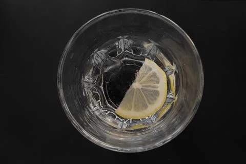 Summer refreshing drink on the rocks with lemon slice . View from above Stock Photos