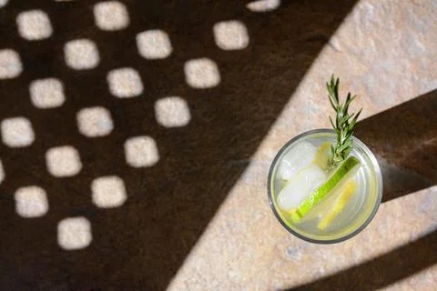 Summer refreshing lemonade on light brown table, top view. Space for text Stock Photos