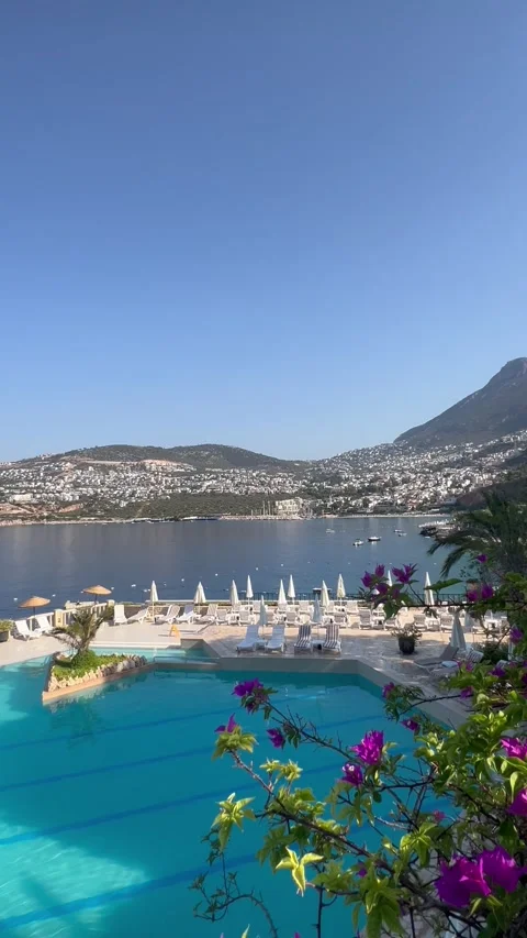 Summer resort with pool in front of the sea Stock Footage 336928082