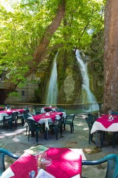 Summer restaurant with a waterfall Stock Photos