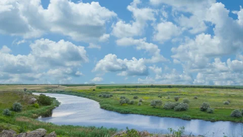 Summer river flow among stony coast at summer day Stock Footage 330549650