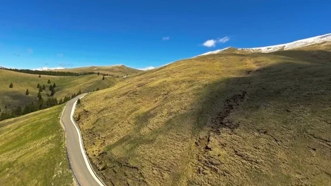 Summer road in mountains Stock Footage 75944168